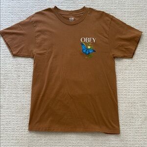 Obey Brown Tee with Blue Butterfly Graphic